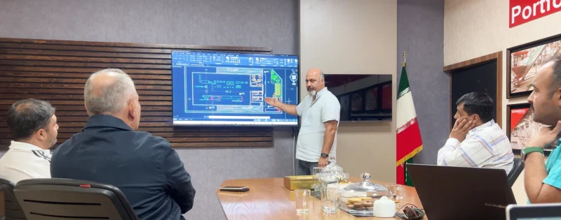 Seamerco team reviewing a factory equipment layout on screen